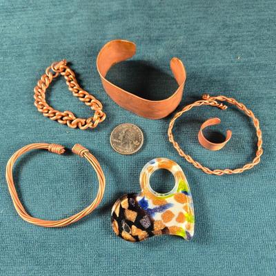 Sale Photo Thumbnail #156: This auction lot is for an All About Copper Jewelry Grouping. This is a fun grouping of handmade 5 solid copper pieces of copper with a Murano Glass Heart pendant with copper accents..  The copper jewelry consists of 4 different bracelets and 1 adjustable