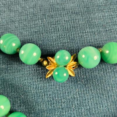 Sale Photo Thumbnail #162: This auction lot is for a Trio of Quality Beaded Necklaces. This is a grouping of 3 quality beaded costume jewelry necklaces. The first one is a multi-colored glass stones encased in sealed polished brass with matching pierced earrings.  It hangs down abo