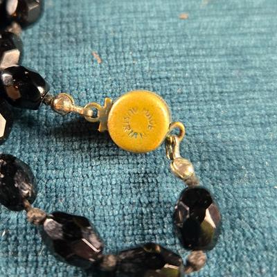 Sale Photo Thumbnail #157: This auction lot is for a Trio of Quality Beaded Necklaces. This is a grouping of 3 quality beaded costume jewelry necklaces. The first one is a multi-colored glass stones encased in sealed polished brass with matching pierced earrings.  It hangs down abo