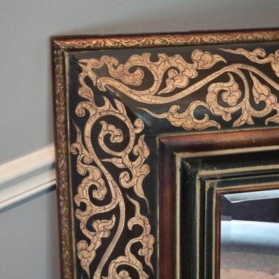 LOT 103Z: Large Black and Gold-tone Framed Decorative Mirror