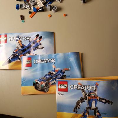 LOT 128B: Lego Creator Thunder Wings, Aviation Adventures & Lego Movie Sets Bad Cop's Pursuit & MetalBeard's Duel