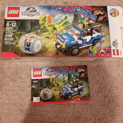 LOT 129B: Lego Jurassic World Sets-Raptor Rampage, Dilophosaurus Ambush, Pteranodon Capture, T Rex Tracker, Indominus Rex Breakout
