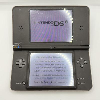 LOT 149K: Nintendo DSi XL w/ Charger