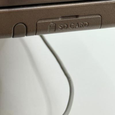 LOT 149K: Nintendo DSi XL w/ Charger