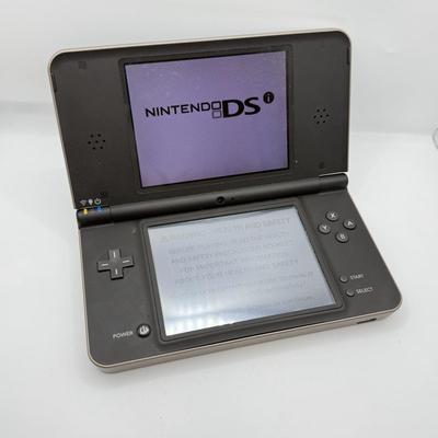 LOT 149K: Nintendo DSi XL w/ Charger
