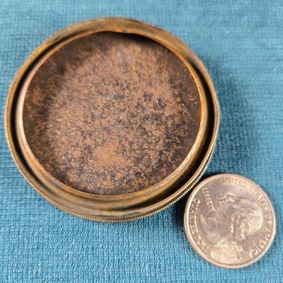 Sale Photo Thumbnail #185: This is a Victorian Mourning Broach Style Framed Tin Type.  It is of a middle age gentleman.  The glass cover is thick and has a deep bevel to it.  The frame is maybe silver plate.  There is no pin on the back to make it a broach, plus it is larger that m
