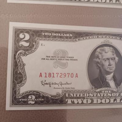 SEQUENTIAL RED SEAL TWO DOLLAR BILLS