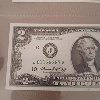 3 UNC $2 DOLLAR BILLS. 2 ARE SEQUENTIAL, THREE $2 BILLS 2 ARE SEQUENTIAL