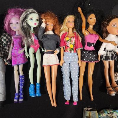 Sale Photo Thumbnail #338: Vintage Barbie & Bratz Doll Lot Rare Space Barbie & Sabrina's Ken Winkle plus many more.