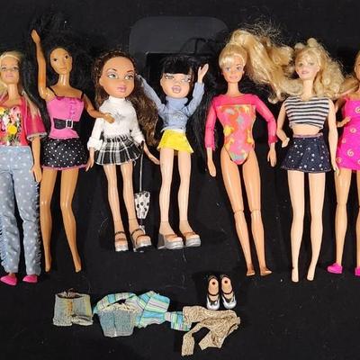 Sale Photo Thumbnail #337: Vintage Barbie & Bratz Doll Lot Rare Space Barbie & Sabrina's Ken Winkle plus many more.