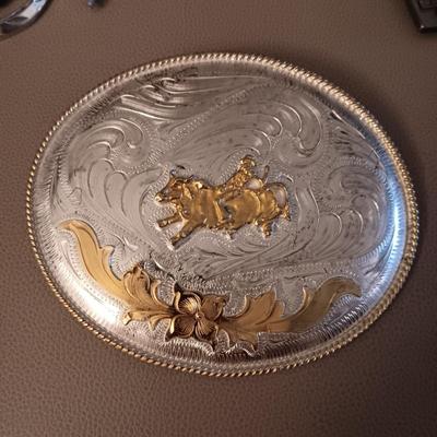 VERY LARGE RODEO AND TONY LAMA LEATHER BELT BUCKLES