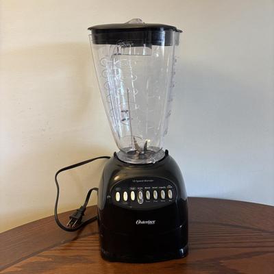 LOT 85: Oster Blender, Hand-Painted Mug,Polka Dot Beverage Glasses, Fountain ware Soda Glasses & More