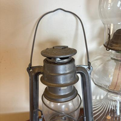 LOT 89: Cast Iron "Give Me a Penny" Bank, Vintage Hurricane/Oil Lamp, Indoor/Outdoor Thermometer & More