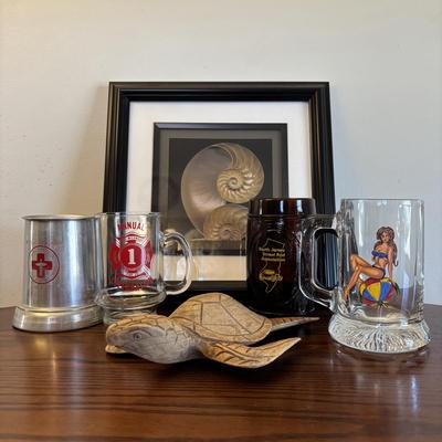 LOT 90: At the Beach Collection: a "Girly" Mug, Wildwood Glasses, Carved Wooden Sea Turtle & Framed Print of Nautilus Shell