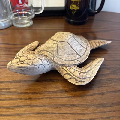 LOT 90: At the Beach Collection: a "Girly" Mug, Wildwood Glasses, Carved Wooden Sea Turtle & Framed Print of Nautilus Shell