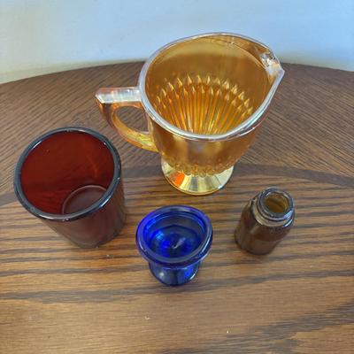 LOT 91: Vintage Hazel-Atlas Juicer, Spry Measuring Glass, Abbots Milk Bottle, Cobalt Blue Eye Cup, Carnival Glass Creamer, Hurricane Lamp...