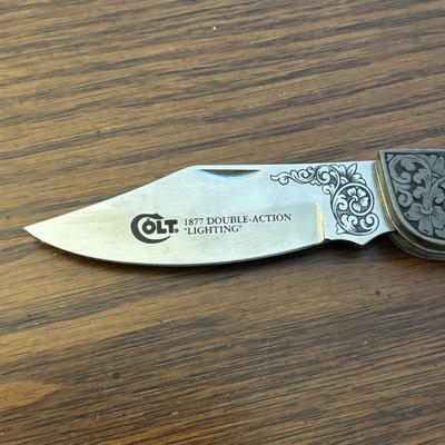 LOT 93: Frost Cutlery Pocket Knife & Franklin Mint Colt 1877 Double Action "Lightning"