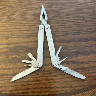 LOT 94: Pocket Knives: Brown Stone 715, Leatherman Tool, Combo Edge