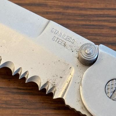 LOT 94: Pocket Knives: Brown Stone 715, Leatherman Tool, Combo Edge