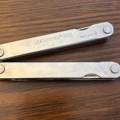 LOT 94: Pocket Knives: Brown Stone 715, Leatherman Tool, Combo Edge