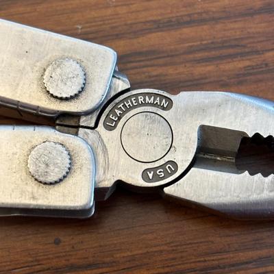 LOT 94: Pocket Knives: Brown Stone 715, Leatherman Tool, Combo Edge