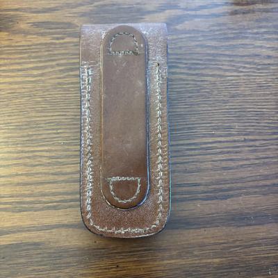 LOT 94: Pocket Knives: Brown Stone 715, Leatherman Tool, Combo Edge