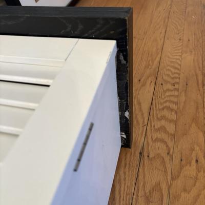 LOT 500: Home Decor Collection: Fish Wall Art, Wooden Model Pirate Ship, White Storage Cabinet, Framed Wall Art, Metal Pillar Candle Holders