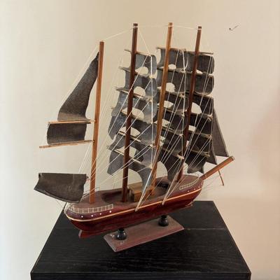 LOT 500: Home Decor Collection: Fish Wall Art, Wooden Model Pirate Ship, White Storage Cabinet, Framed Wall Art, Metal Pillar Candle Holders