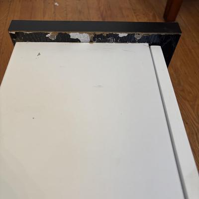 LOT 500: Home Decor Collection: Fish Wall Art, Wooden Model Pirate Ship, White Storage Cabinet, Framed Wall Art, Metal Pillar Candle Holders