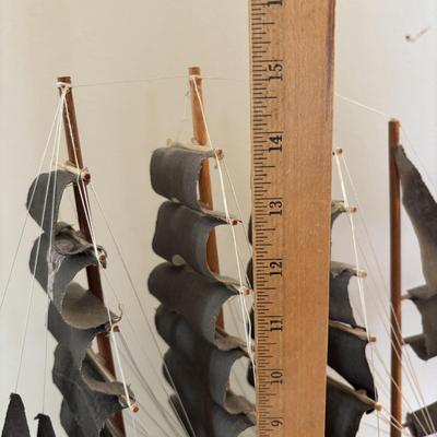 LOT 500: Home Decor Collection: Fish Wall Art, Wooden Model Pirate Ship, White Storage Cabinet, Framed Wall Art, Metal Pillar Candle Holders