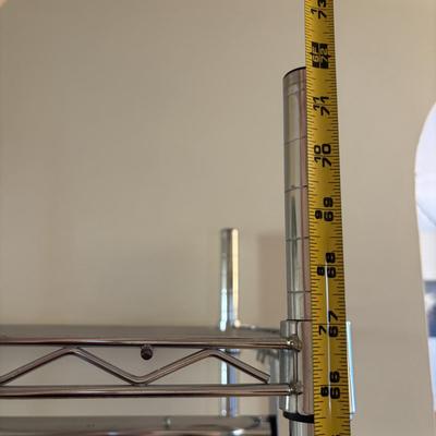 LOT 101: Metal Garment Rack on Wheels, Rubber Maid Storage Tote, Sterilite Footlocker on Wheels & Intertek Tower Fan