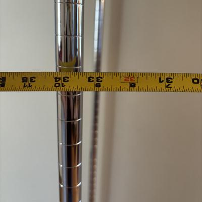 LOT 101: Metal Garment Rack on Wheels, Rubber Maid Storage Tote, Sterilite Footlocker on Wheels & Intertek Tower Fan