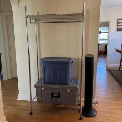 LOT 101: Metal Garment Rack on Wheels, Rubber Maid Storage Tote, Sterilite Footlocker on Wheels & Intertek Tower Fan