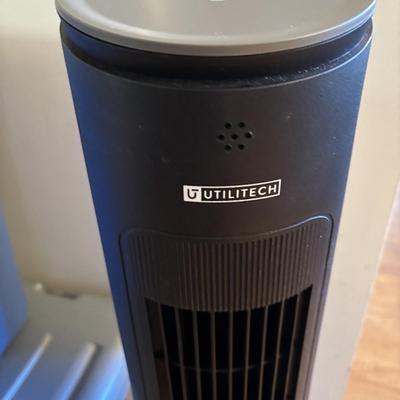 LOT 101: Metal Garment Rack on Wheels, Rubber Maid Storage Tote, Sterilite Footlocker on Wheels & Intertek Tower Fan