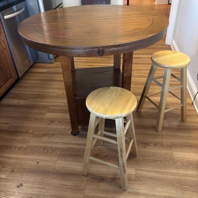 LOT 106: Round Pub Style table w/2 Wooden Stools