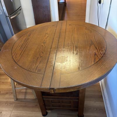 LOT 106: Round Pub Style table w/2 Wooden Stools