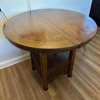 LOT 106: Round Pub Style table w/2 Wooden Stools