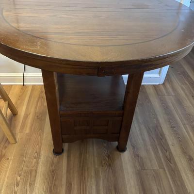 LOT 106: Round Pub Style table w/2 Wooden Stools