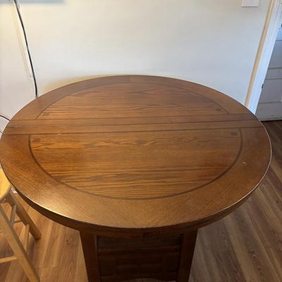 LOT 106: Round Pub Style table w/2 Wooden Stools