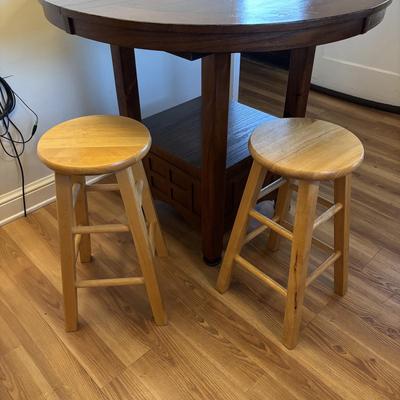 LOT 106: Round Pub Style table w/2 Wooden Stools