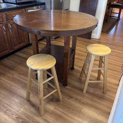 LOT 106: Round Pub Style table w/2 Wooden Stools