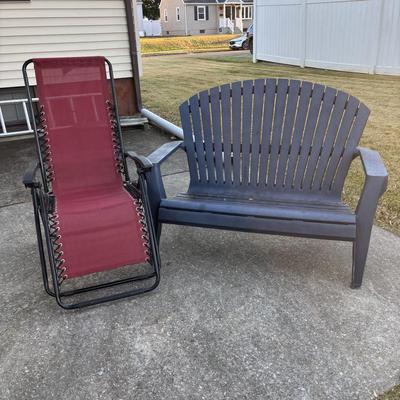 LOT 107: Outdoor Zero Gravity Chair along with an Adirondack Plastic Love Seat (appears to be painted)