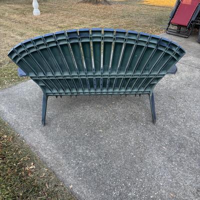 LOT 107: Outdoor Zero Gravity Chair along with an Adirondack Plastic Love Seat (appears to be painted)