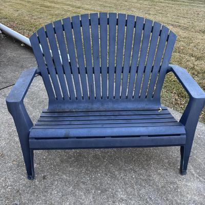 LOT 107: Outdoor Zero Gravity Chair along with an Adirondack Plastic Love Seat (appears to be painted)