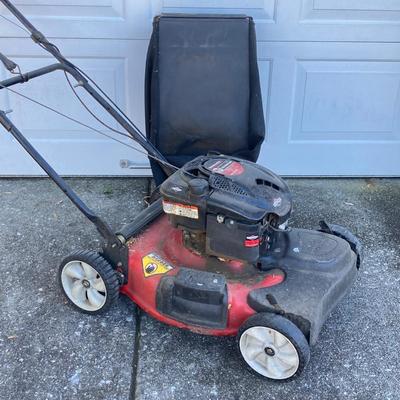 LOT 114: Yard Machines MTD Gas Powered Self Propelled Lawn Mower Model No. 12A-464T020 with Bag