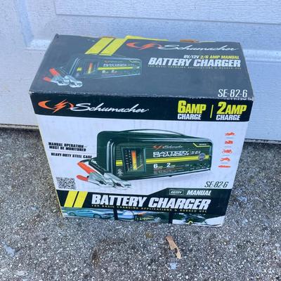 LOT 118: Shop Vac Wet / Dry 5 Gallon Vac, Schumacher Battery Charger in Original Box, Lug-All Hoist and The Club Steering Wheel Lock with...