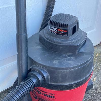 LOT 118: Shop Vac Wet / Dry 5 Gallon Vac, Schumacher Battery Charger in Original Box, Lug-All Hoist and The Club Steering Wheel Lock with...