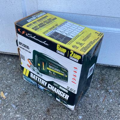 LOT 118: Shop Vac Wet / Dry 5 Gallon Vac, Schumacher Battery Charger in Original Box, Lug-All Hoist and The Club Steering Wheel Lock with...