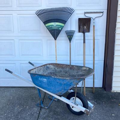 LOT 120: Jackson Metal Wheel Barrow with Rakes and Shovel