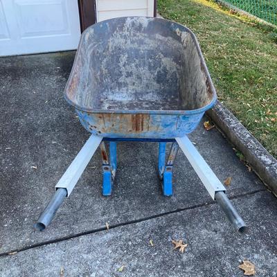 LOT 120: Jackson Metal Wheel Barrow with Rakes and Shovel